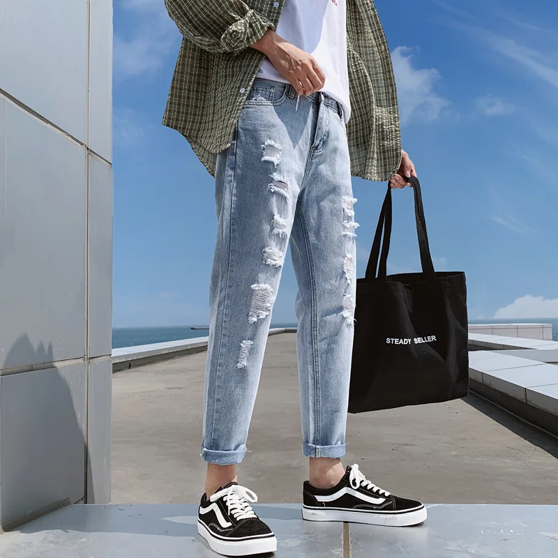 

Autumn and summer new style ripped jeans men's trend Korean version of slim young students' feet pants 9 points pants