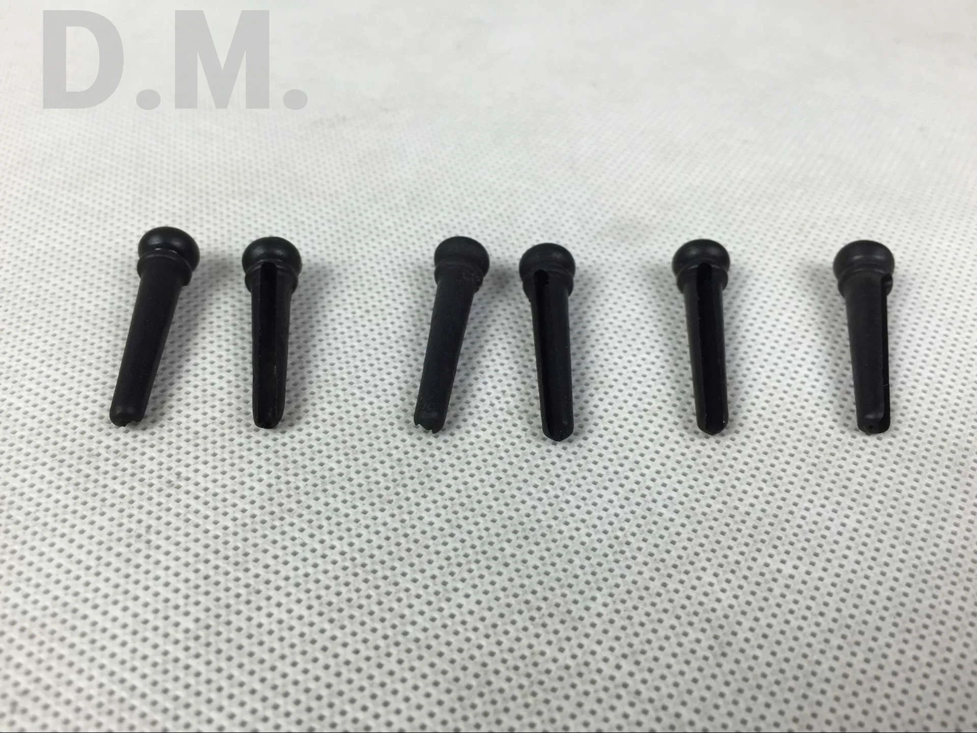 Factory Direct Selling Customizable Top Grade Guitar Strings Cone Ebony Material zhen bei Solid String Nail Black And White with