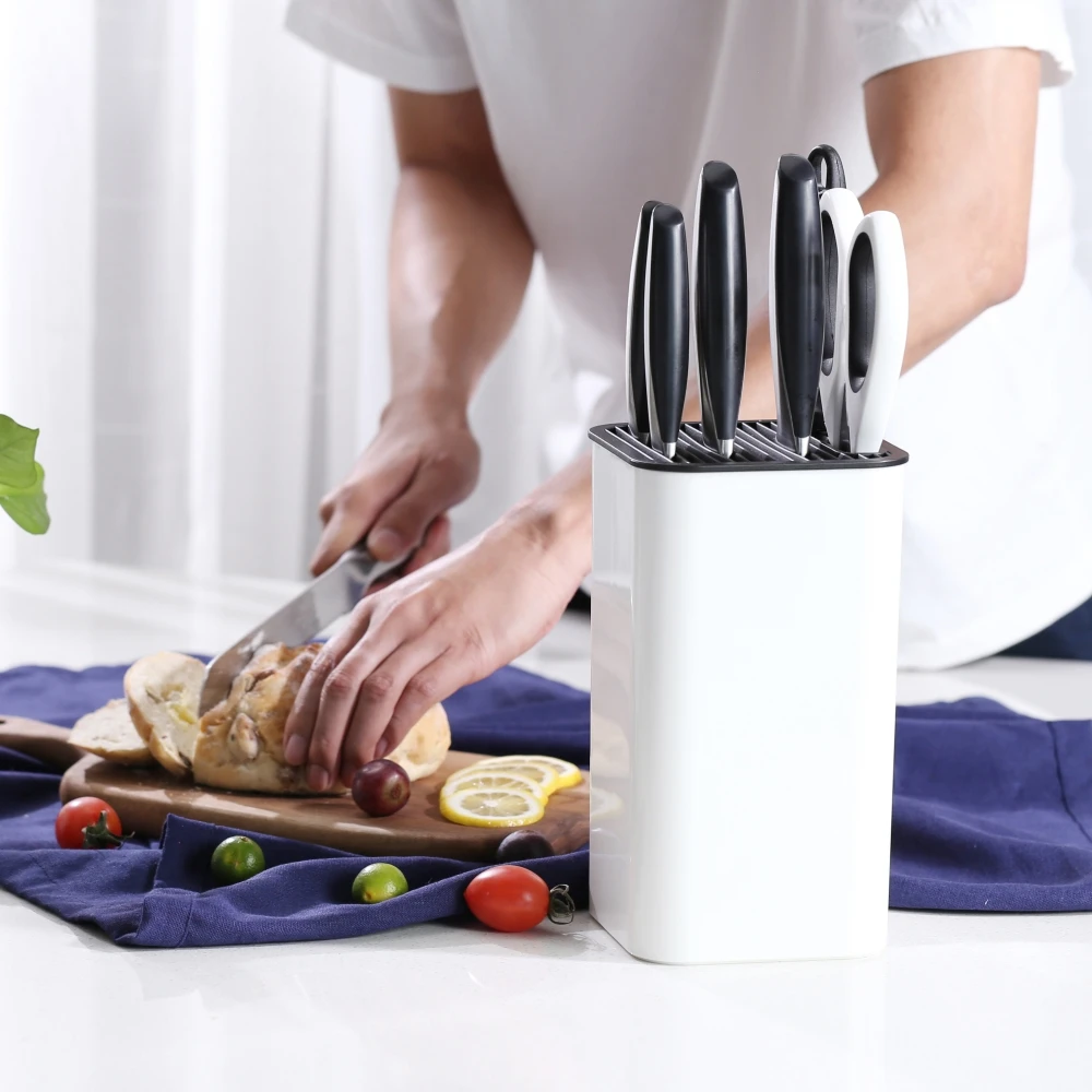 https://ae01.alicdn.com/kf/He3ca3f712724448484982754e19938115/KITCHENDAO-XL-Universal-Knife-Block-with-Slots-for-Scissors-Detachable-for-Easy-Cleaning-Space-Saver-Knife.jpg