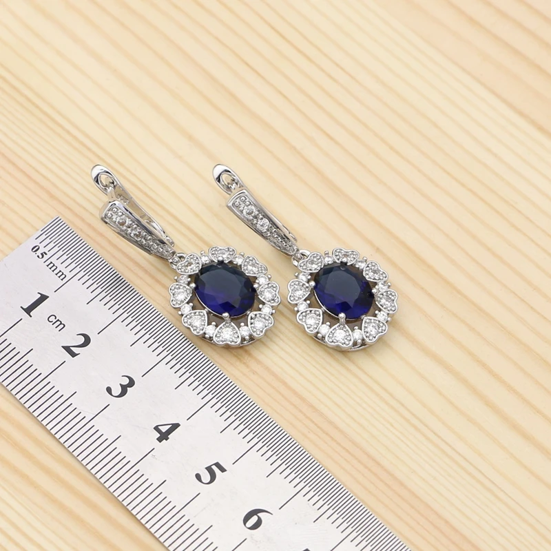 Женский ювелирный комплект из кольца браслета и сережек серебра 925