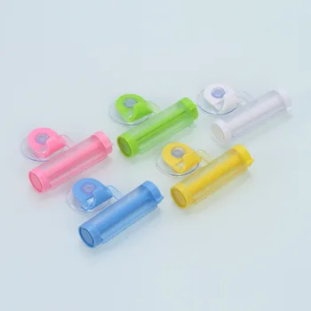

A2809 Creative Squeeze Small Partners Maker Toothpaste Dispenser Sucker Hook Toothpaste Dispenser