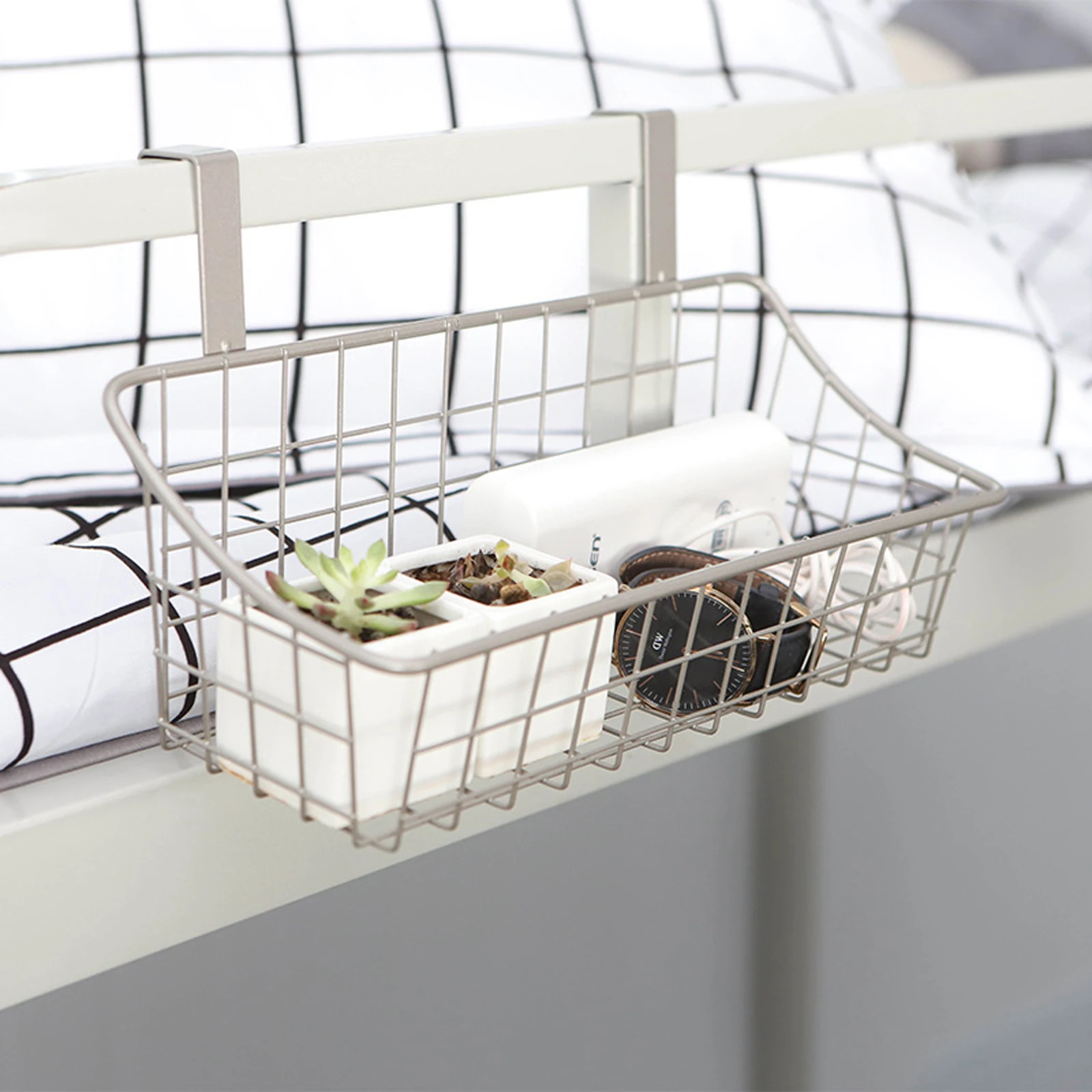 https://ae01.alicdn.com/kf/He3eb6d6e6bc64fc582610d4b3b4e41a8C/Small-Dormitory-Bedside-Hanging-Basket-Solid-Color-Iron-Storage-Rack-Hanging-Bathroom-Drain-Basket.jpg