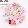 7 Pairs Mini Lovely Ear Clips for Girls Hypoallergenic No Piercing Plastic Earrings for Kids with Pain-resistan 1