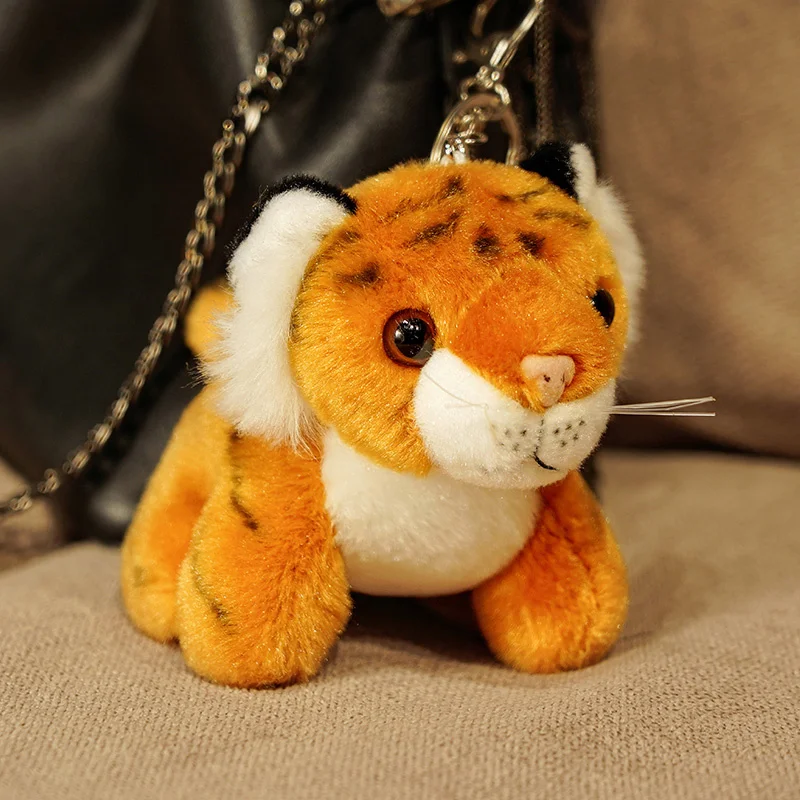 thumbnail image 1 of LLavero de peluche de Animal de dibujos animados para niña, llavero creativo de 10cm, Mini Tigre, juguete de peluche, 1 unidad, 1 of 4