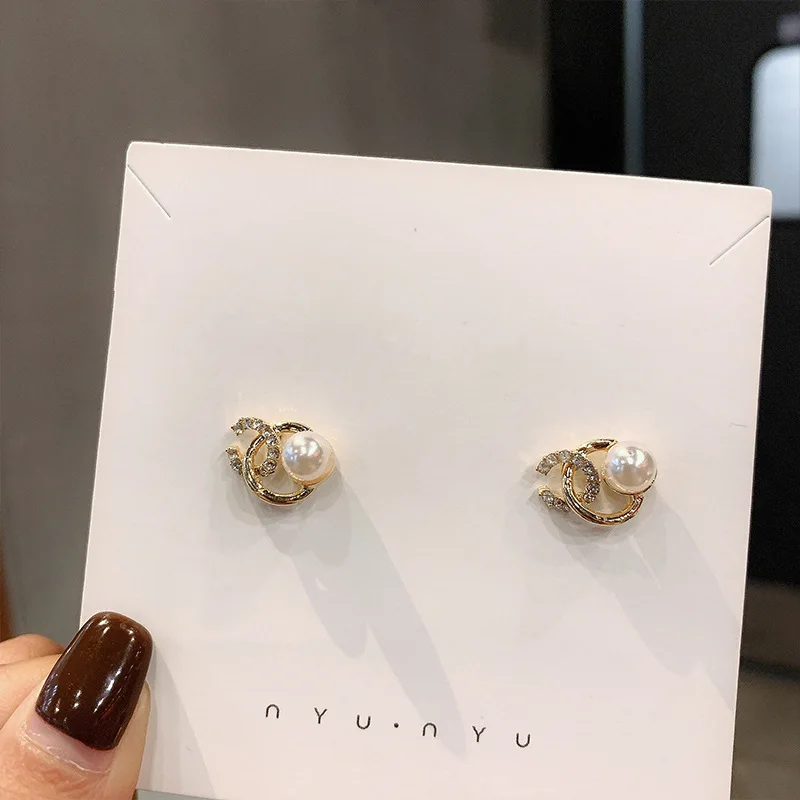

Silver Needle Ear Nail Micro-inlaid Pearl Xiaozhong Net Red Ear Ornament Korean temperament Simple Mingyuan Earring Female