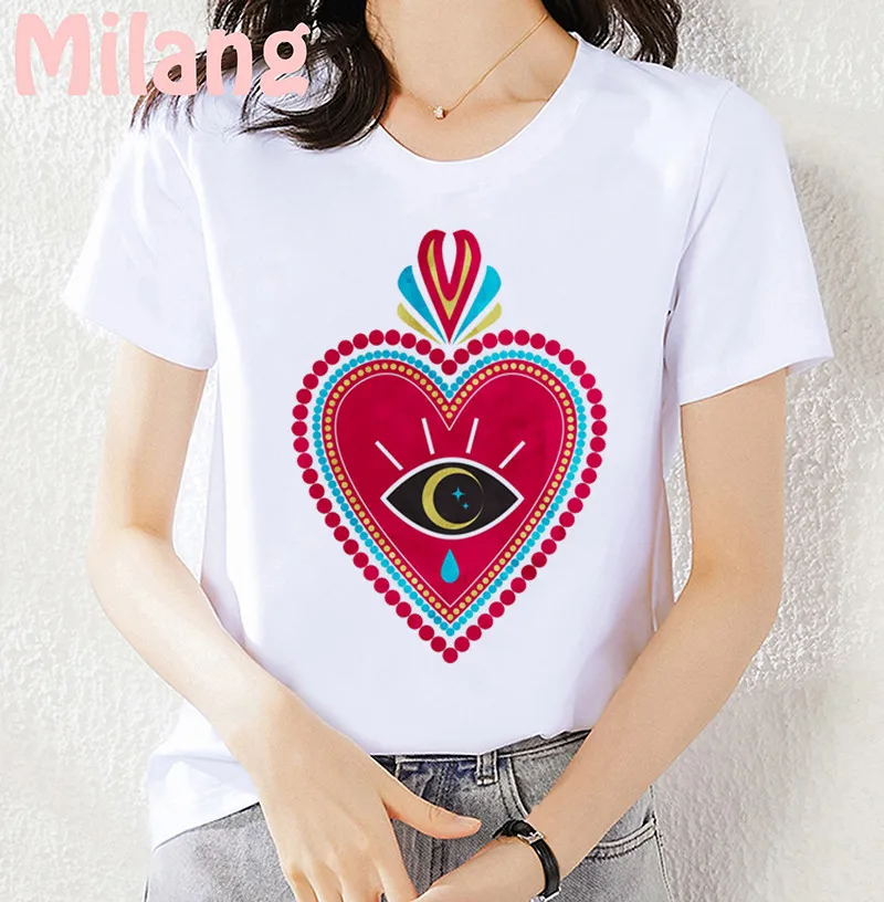 WHITE T SHIRT WITH RED HEART WITH EYES MOTIF