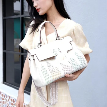 

34cm leather bag 2020 new version rivet hollow fashion handbag first layer leather crossbody bag large capacity