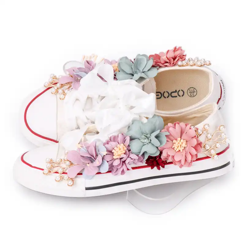 white sneakers with flowers