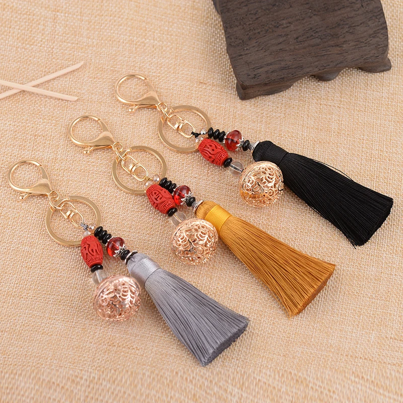 

Tassel KeyChains Hollow Ball Key Ring Bag Hanging Gift Car Party Jewelry Round Bell Ice Silk Tassel Keychain