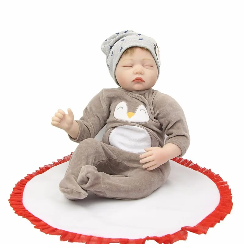 

Keiumi 22-Inch Reborn Baby Doll Reborn Baby Model Infant Soft Silicone Boy to Sleep with Doll
