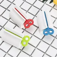 Toothpaste Dispenser Tube Squeezer Tooth Paste Squeezer Facial Cleanser Press Rolling Holder Bathroom Accessories for Kids 1