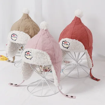 

Baby hat 2019 autumn and winter plush hair ball earmuffs 2-4 years old baby Korean comfortable skin Thicken warm Lei Feng hat