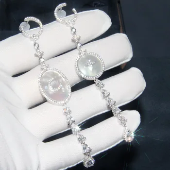 

Baoyocn Luxury S925 Sterling Silver Pink Silver Moon Star Drop Earrings with Mother of Pearl Cubic Zirconia Stones Women Jewelry