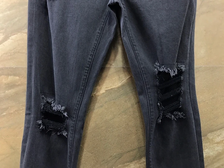 The new autumn and winter women's street personality hole jeans 1207