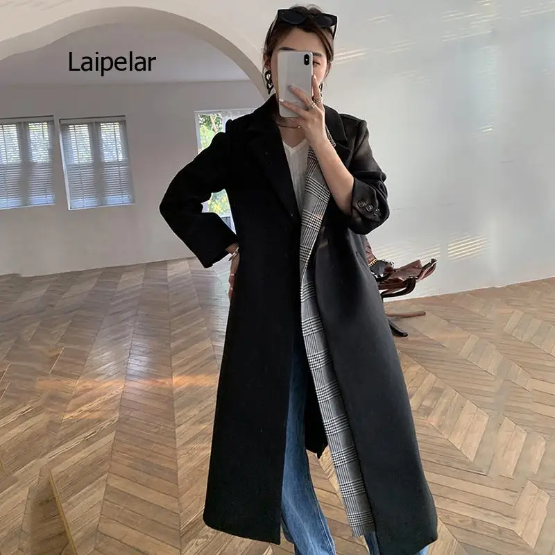 Женское шерстяное пальто в клетку