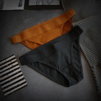 

Women's pure cotton underwear mid waist simple sexy traceless thread breathable Japanese pure color girl's briefs