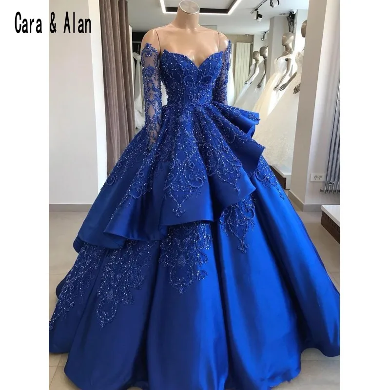 

Modest Ball Gown Royal Blue Quinceanera Dresses Long Sleeve Beaded Layered Off The Shoulder Satin Sweep Train