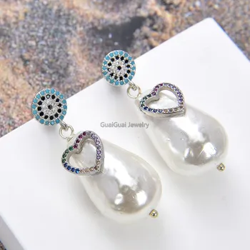 

GG Jewelry White teardrop Sea Shell Pearl Cz pave Heart shaped Earrings