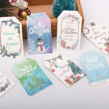 

50PCS/LOT Merry Christmas Paper Tags With Rope DIY Crafts Cards Christmas Party Hanging Labels Gifts Wrapping Home Supplies