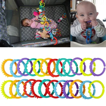 

Drop Ship Baby Teething Ring Colorful Rainbow Rings Stroller Gift Decoration Toys 24Pcs