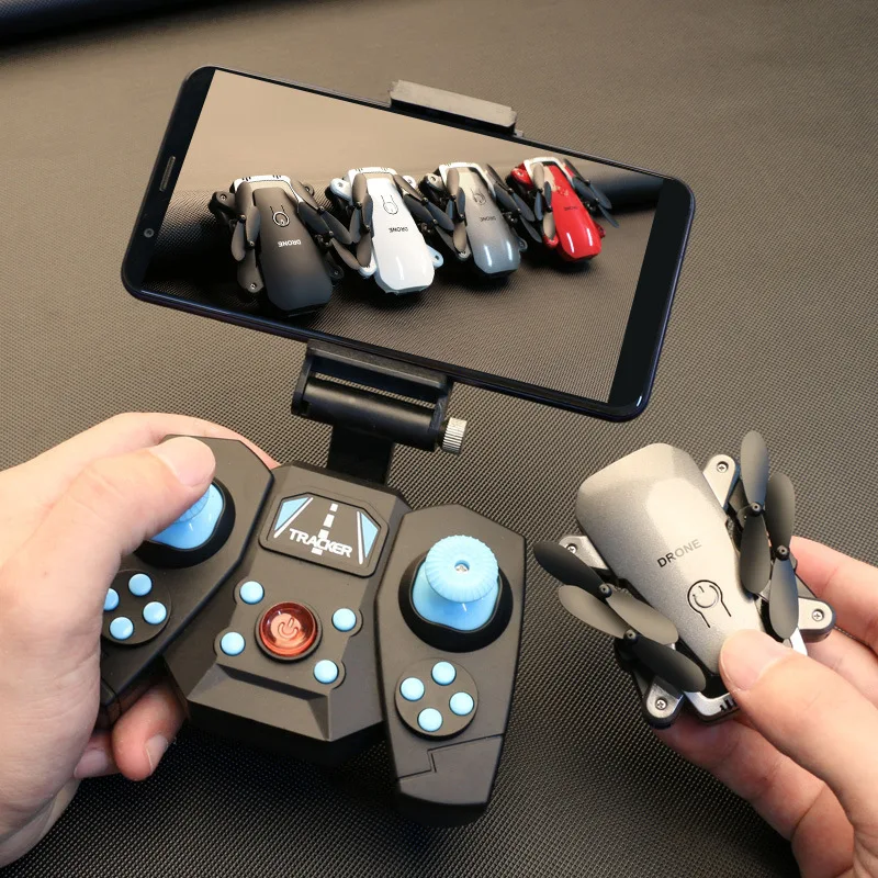 

Four-axis Folding Aircraft Gesture Photo Shoot Mini Unmanned Aerial Vehicle Set High Aerial Photography Real-Time Transmission R