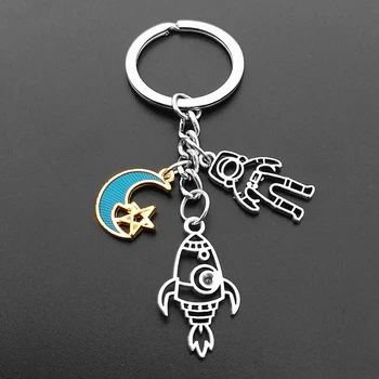 

Escape From The Earth ! Cute UFO Space Astronaut Rocket Planet Spaceman Universe Stars Metal Key Ring KeyChain for Astrophile