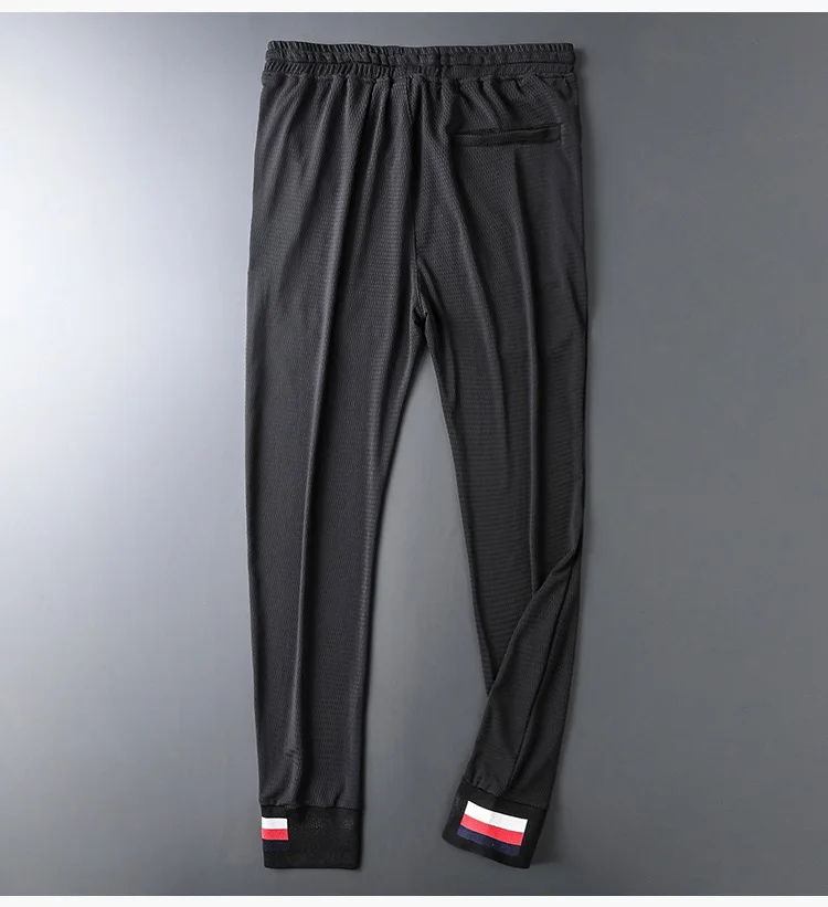 Autumn Black Hollow Out Mens Pants Loose Drawstring Sports Pants Streetwear Fashion Designer Joggers Calca Masculina