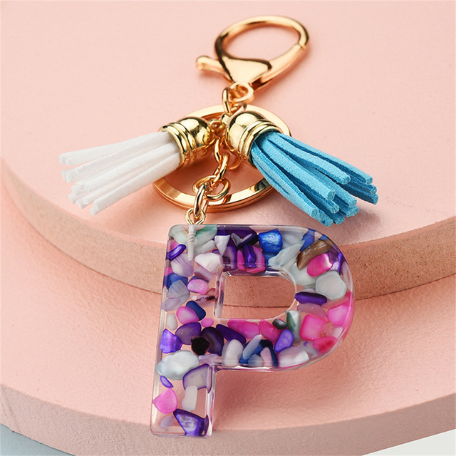 Women Keychains 26 Glitter Hollowed-out Words Handbag Tassel English Letter Keyring with Puffer Ball Charms Free Shipping