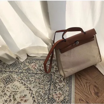 

2020 summer new fashion women's shoulder messenger bag canvas with first layer leather pumping strap ladies handbag
