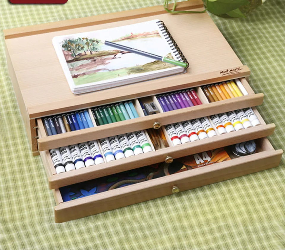 Premium Photo  Drawing-pad and color pencils on a wooden table