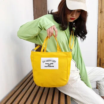 

Korean student canvas bag female shoulder messenger bag 2020 summer new letter college style portable small bag