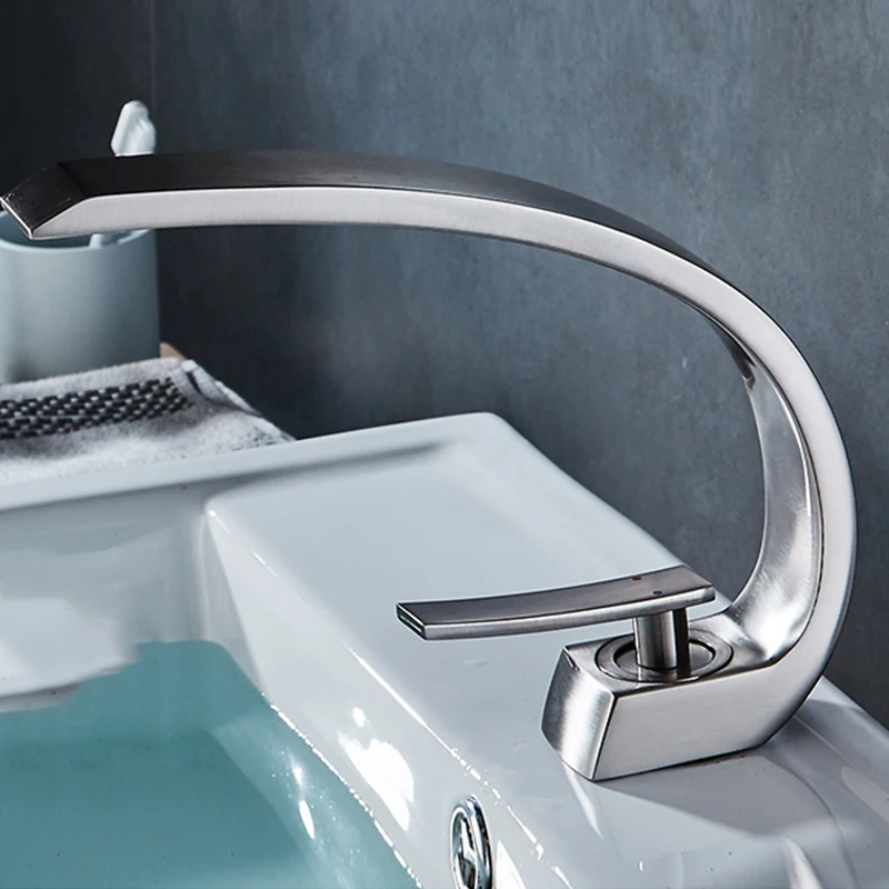 

Free shipping Chrome Brass Bathroom Faucet.basin faucet mixer tap with Hot&cold water.deck mounted water taps