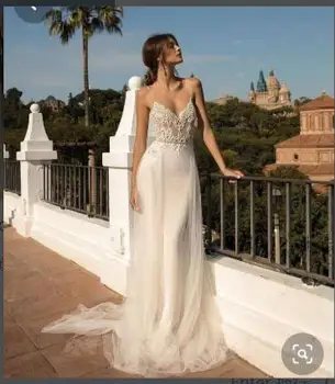 

Beach Wedding Dresses Spaghetti Straps Illusion Lace abito da sposa Dubai Arabic Boho Wedding Dress Bridal Dress