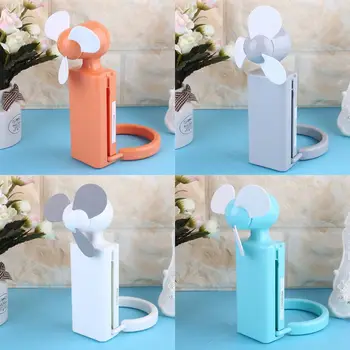 

Portable mini fan Cool Air Hand Held Travel Cooler Cooling Mini Desk Fans Powered By 2x AA 1.5V Battery For Outdoor Home Office
