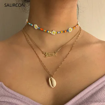 

Salircon Boho Daisy Flower Choker Necklaces Fashion Gold Color Chain Collar Shell Letter Pendant Necklace Women Couple Jewelry