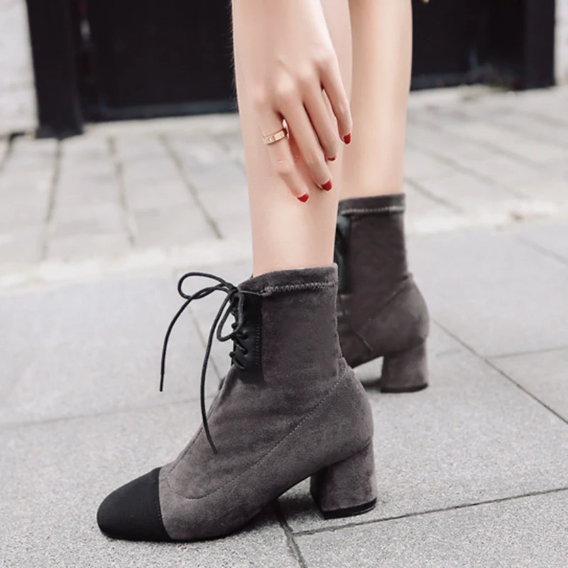 

Women autumn and winter sexy booties in the waist and calfskin elastic socks boots thick high heels with pointed strap boots