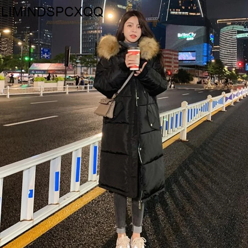 

Пуховик женский зимний средней длины, с капюшоном и меховым воротником