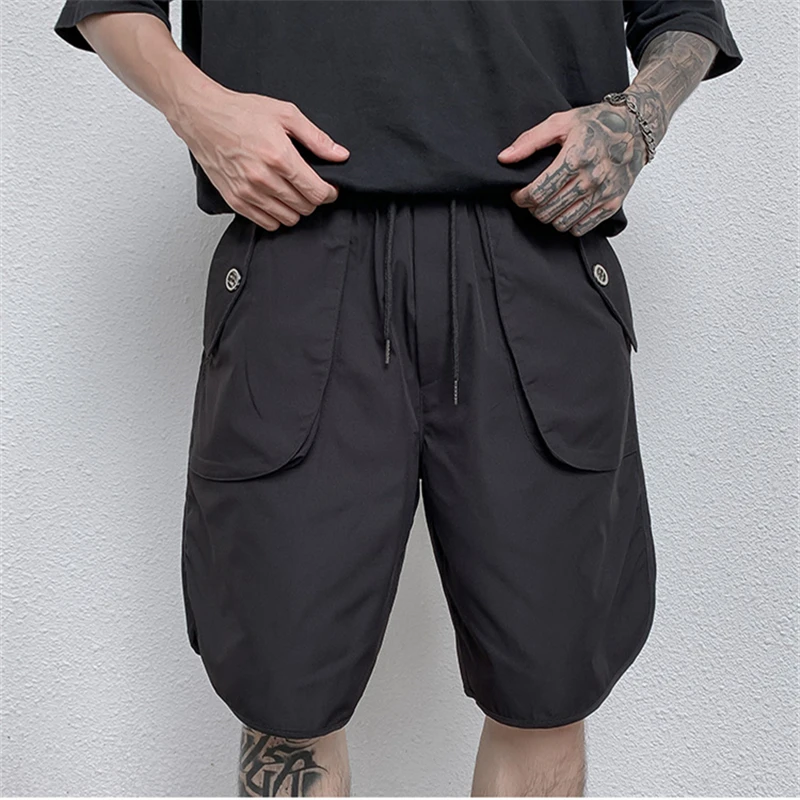 Una Reta M-3XL 남성 짧은 여름 Streetwear 탄성 허리 무릎 길이 포켓 스웨트 팬츠 힙합 솔리드 루스 반바지