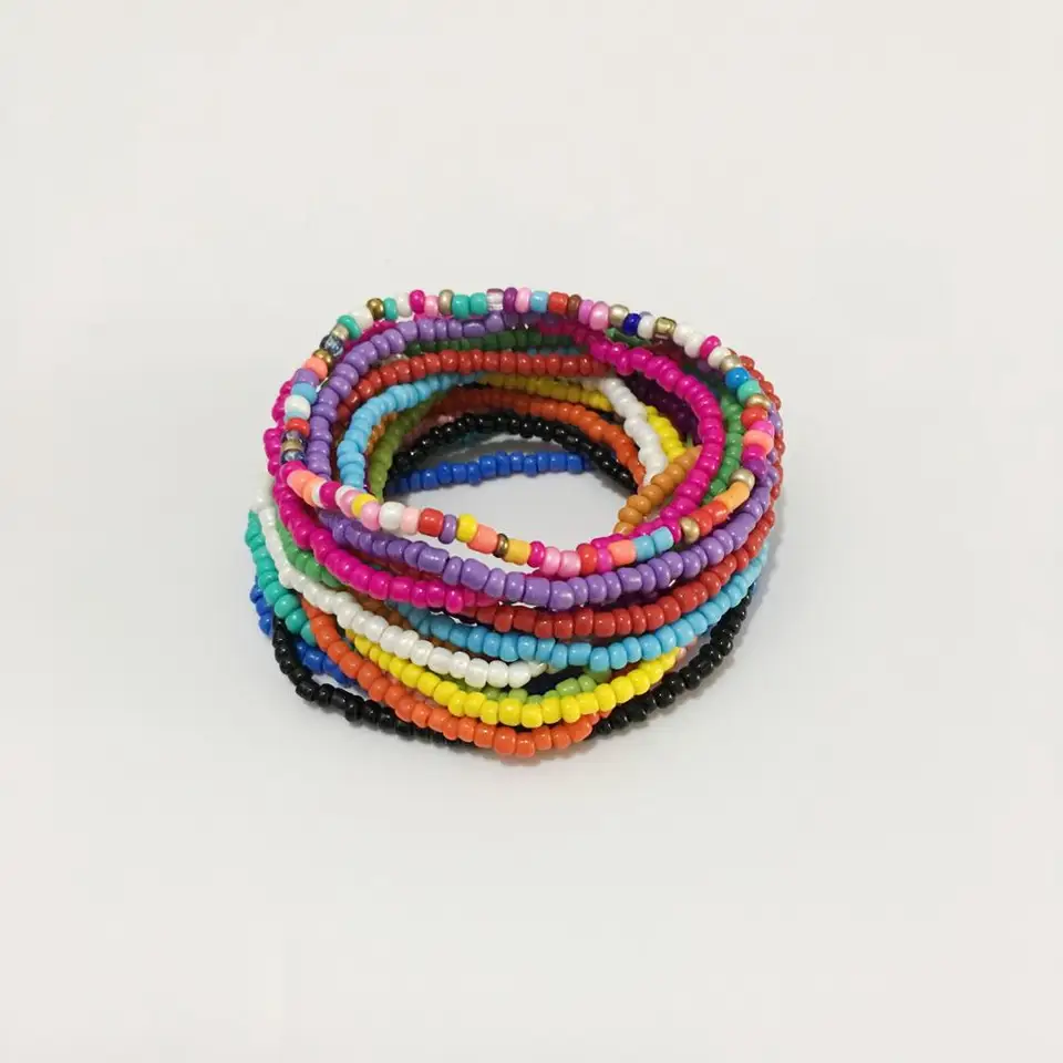 Set di braccialetti con perline di semi Picasso: braccialetti impilabili Boho - Italia