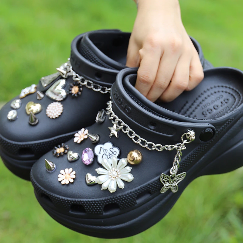 black designer crocs