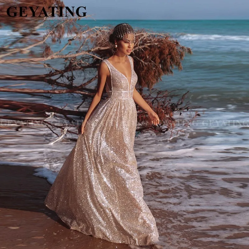 Sexy V-hals Backless Rose Gold Prom Dresses 2020 Glitter Sequin Lange Arabisch Avondjurk A-lijn Afrikaanse Formele Partij Jassen Sexy V-hals Backless Rose Gold Prom Dresses 2020 Glitter Sequin Lange Arabisch Avondjurk A-lijn Afrikaanse Formele Partij Jassen