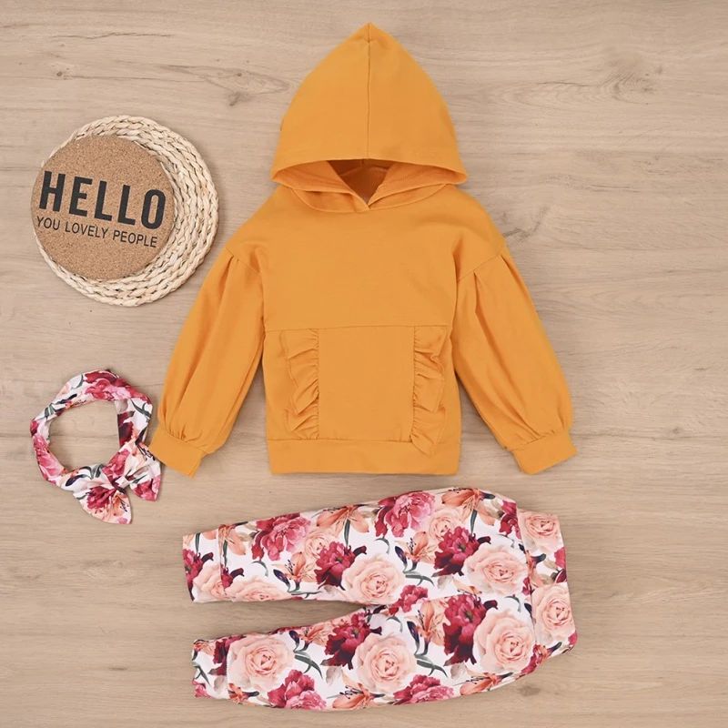 orange sweatshirt outfit