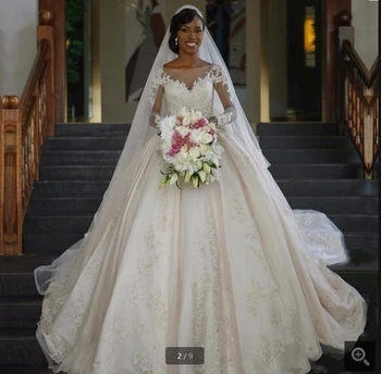 

Modest white Long Sleeves Ball Gown Wedding Dresses Sexy Beaded Lace Applique chapel train Bride Gowns Vestido de Noiva