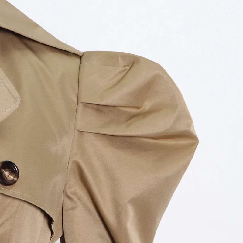 TWOTWINSTYLE Khaki Splicing Windbreaker For Women Lapel Long Sleeve High Waist With Sashes Casual Trench Female Fashion New Tide