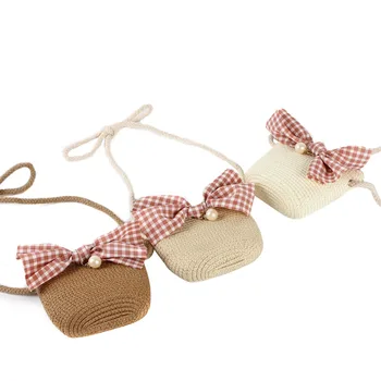 

Pudcoco Crossbody Bag for Girls Mini Kids' Straw Plaiting Bowknot Pearl Shoulder Bag, Cute Summer Beach Messenger Bag Purse