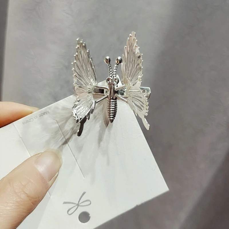 10個3D可動蝶型ヘアクリップ金属中空メタリックフライング