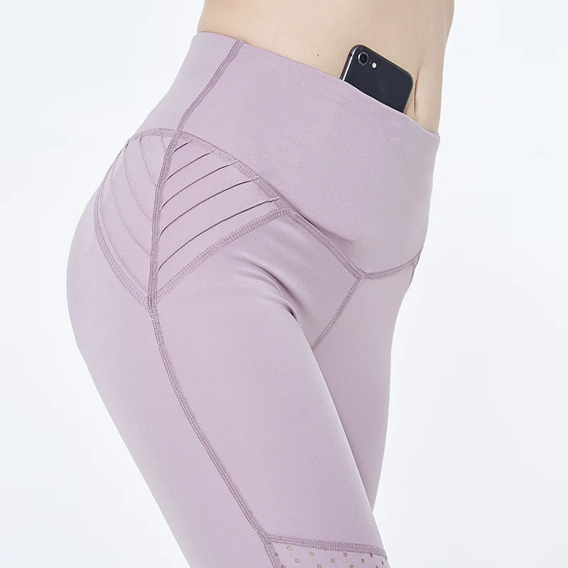 

Sexy Sheer Illusion Yoga Pants With Pocket Breathable Mesh Hollow Out Split Joint Hips Close Motion Run Bodybuilding Pants Women