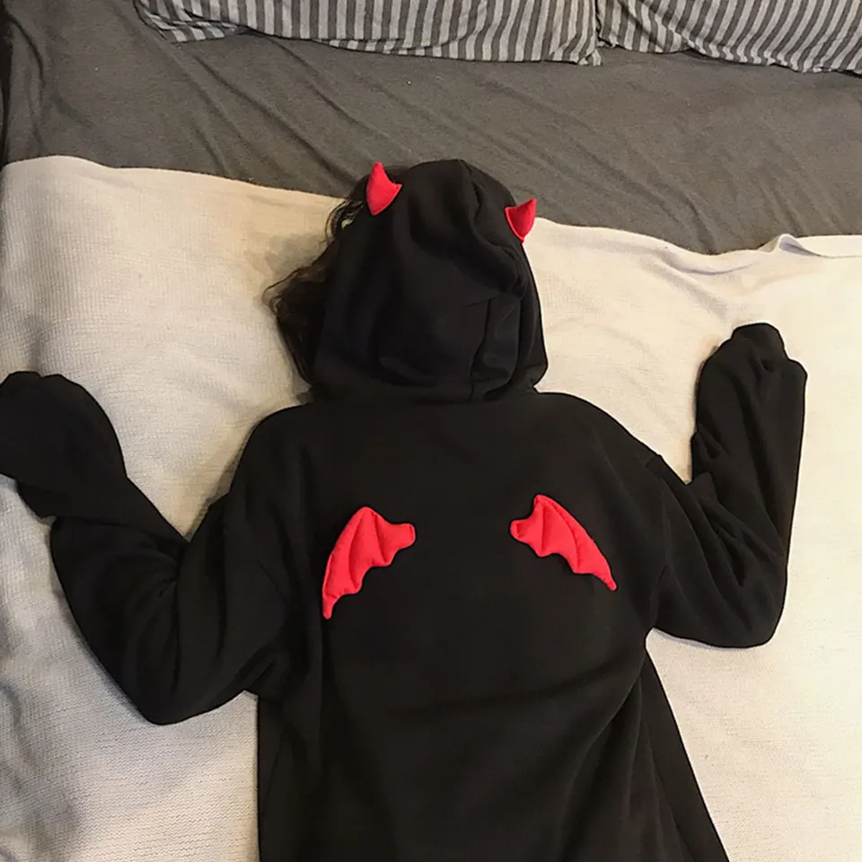 red hoodie with devil horns