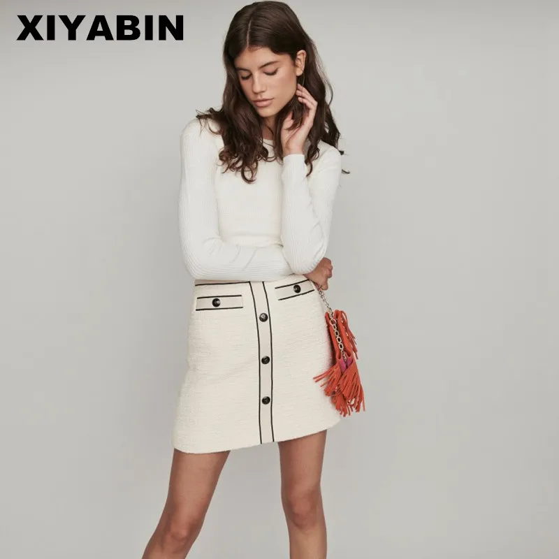 

2019 New autumn and winter white Small fragrant wind Simplicity Wild Joker temperament Button Skirt Short skirt