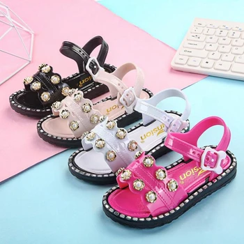 

2020 summer children's sandals baby princess shoes girl's hollow diamond pearl beach shoes wear Roman shoes outside